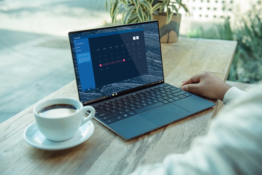 A content calendar on a laptop, the honest workspace for agent-assisted social