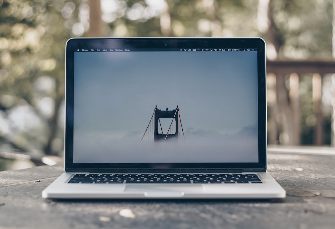 A laptop with an open-source project on screen, standing in for a project that changed names twice