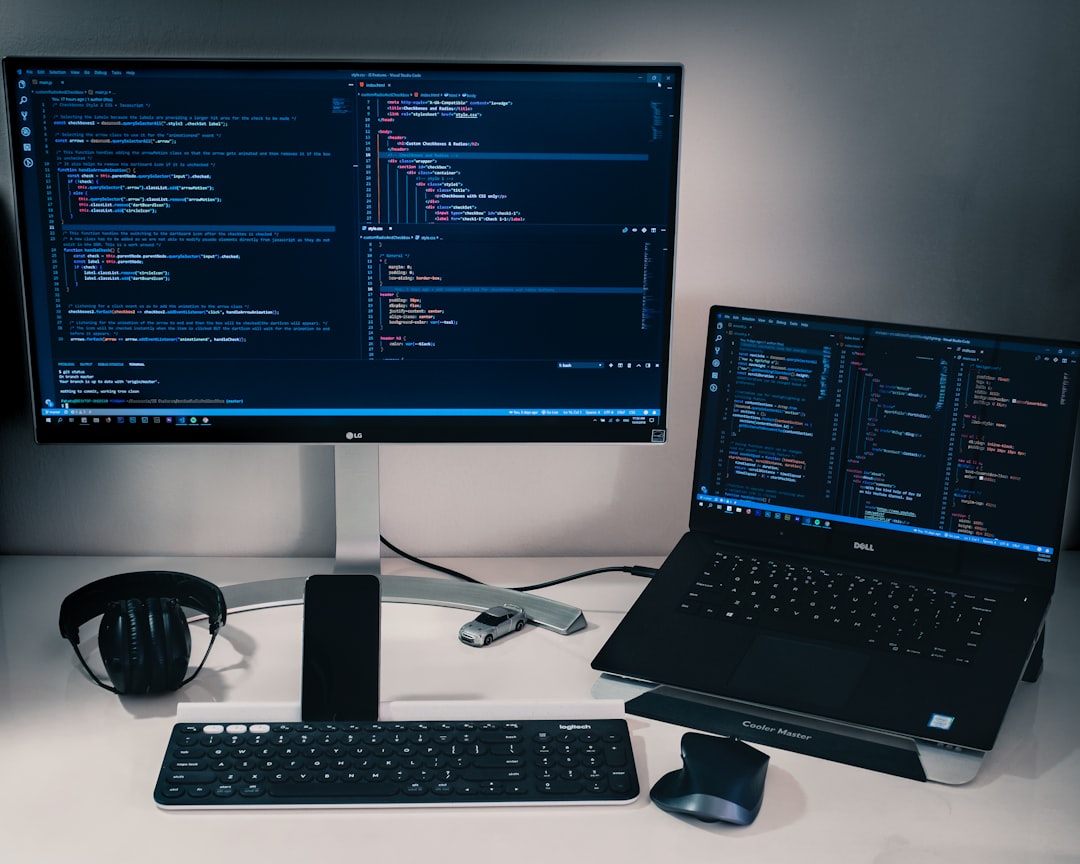Two laptops on a shared desk, a visual for running two agent runtimes